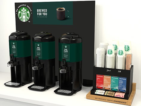 Starbucks-kaféhörna i en företagsmiljö.